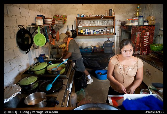 Woman and man in a restaurant kitchen, Jalisco. Jalisco, Mexico (color)