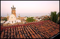 Tiled rooftop and Cathedral, and ocean at dawn, Puerto Vallarta, Jalisco. Jalisco, Mexico