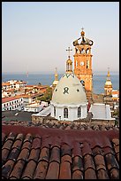 Red tile roof, Templo de Guadalupe Cathedral, and ocean early morning, Puerto Vallarta, Jalisco. Jalisco, Mexico (color)