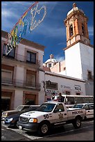 Policemen riding in the back of a pick-up truck. Zacatecas, Mexico (color)