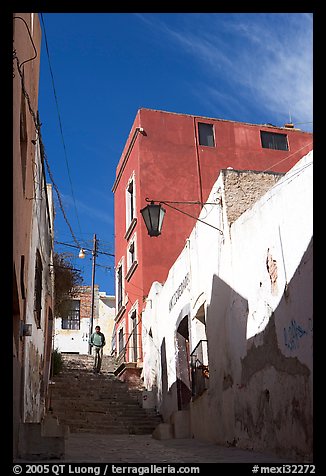 Man walking down stairs of Cajaon de Garcia Rojas. Zacatecas, Mexico (color)