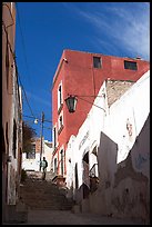 Man walking down stairs of Cajaon de Garcia Rojas. Zacatecas, Mexico ( color)