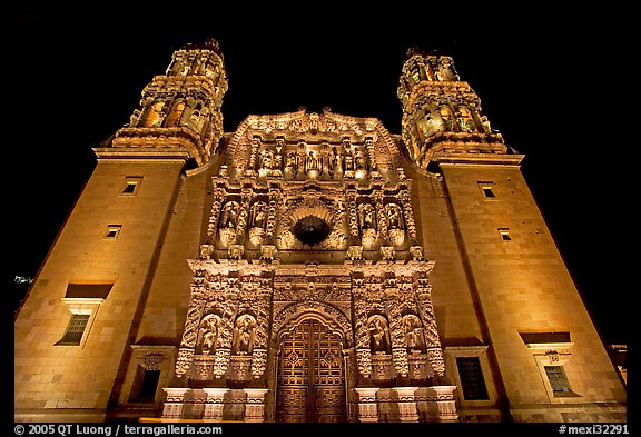 Illuminated facade of Cathdedral laced with Churrigueresque carvings at night. Zacatecas, Mexico (color)