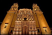 Illuminated facade of Cathdedral laced with Churrigueresque carvings at night. Zacatecas, Mexico