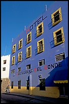 Hotel restaurant building painted bright blue and yellow. Guanajuato, Mexico (color)