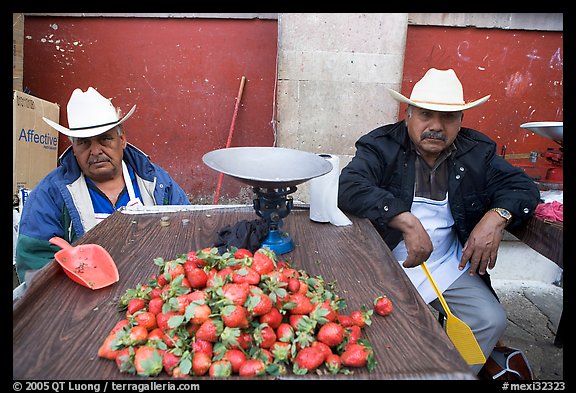 Men with cow-boy hats selling strawberries. Guanajuato, Mexico (color)