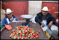 Men with cow-boy hats selling strawberries. Guanajuato, Mexico (color)