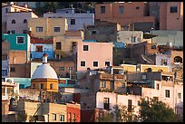Multicolored houses on a steep hillside, late afternoon. Guanajuato, Mexico ( color)
