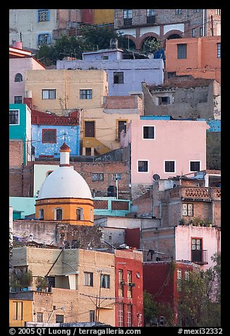 Houses painted with bright colors on a steep hillside. Guanajuato, Mexico