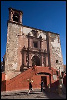 People walking in front of church San Roque, early morning. Guanajuato, Mexico