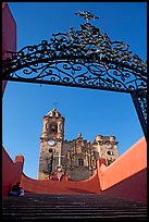 Forged metal gate and La Valenciana church. Guanajuato, Mexico ( color)