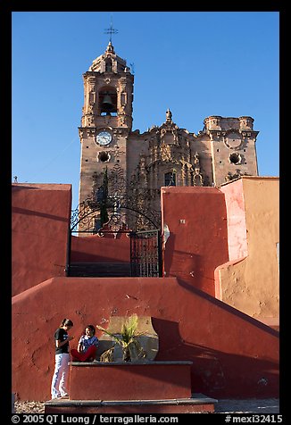 Girls in front of La Valenciana church, late afternoon. Guanajuato, Mexico (color)