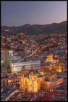 Panoramic view of the historic town with illuminated basilic, university, and La Compania. Guanajuato, Mexico