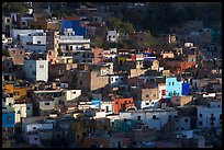Vividly colored houses on hill, early morning. Guanajuato, Mexico (color)