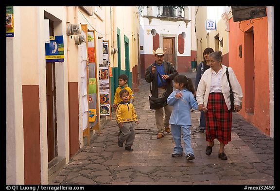 Family walking down an alley. Guanajuato, Mexico (color)