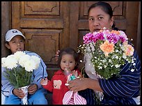 Woman with two children sitting in doorway. Guanajuato, Mexico ( color)