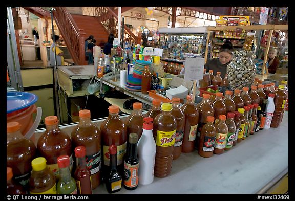Chili bottles at a booth in Mercado Hidalgo. Guanajuato, Mexico (color)