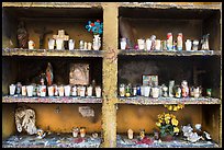 Candles in a roadside chapel. Mexico