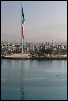 Largest Mexican flag sagging in early morning, Ensenada. Baja California, Mexico (color)