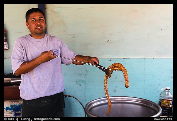 Man making churros. Baja California, Mexico (color)