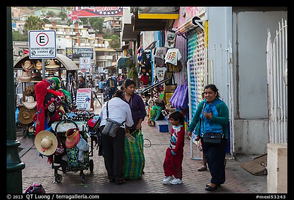 Women packing souvenirs for sale, Ensenada. Baja California, Mexico (color)