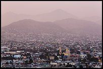 Distant view of Ensendada spreading up hills at sunset. Baja California, Mexico ( color)