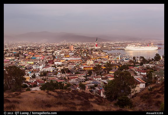 Panoramic view of city from hills at sunset, Ensenada. Baja California, Mexico (color)
