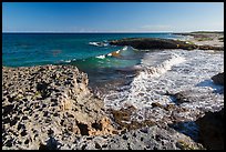Surf and rock with holes. Cozumel Island, Mexico ( color)