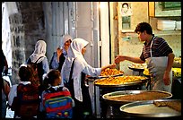 Muslem women purchasing sweets. Jerusalem, Israel