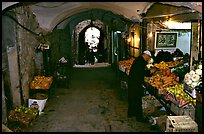 Fruit and vegetable store in an old town archway. Jerusalem, Israel (color)