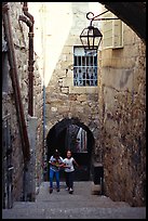 Children on stairs of an old alley. Jerusalem, Israel