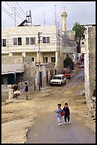 Two schoolchildren in a street of East Jerusalem. Jerusalem, Israel (color)