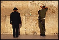 Orthodox Jew and soldier at the Western Wall. Jerusalem, Israel (color)