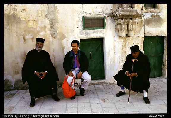 Copt monks and pilgrim in the Ethiopian Monastery. Jerusalem, Israel