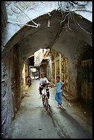 Two children under an archway, Hebron. West Bank, Occupied Territories (Israel)