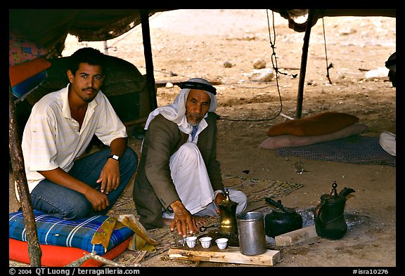 Bedouin men offering tea in a tent, Judean Desert. West Bank, Occupied Territories (Israel) (color)