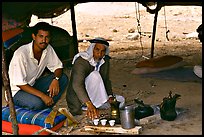 Bedouin men offering tea in a tent, Judean Desert. West Bank, Occupied Territories (Israel)