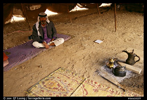 Bedouin man sitting on a carpet in a tent, Judean Desert. West Bank, Occupied Territories (Israel) (color)