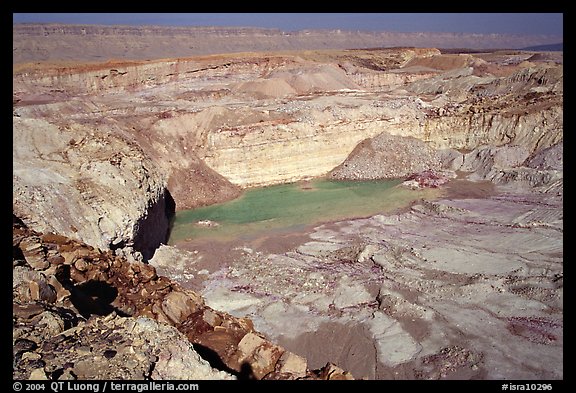 Shallow pond and colored rocks, near Mitzpe Ramon. Negev Desert, Israel (color)