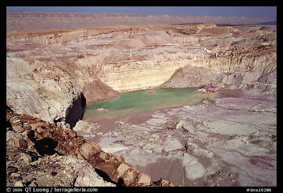 Shallow pond and colored rocks, near Mitzpe Ramon. Negev Desert, Israel