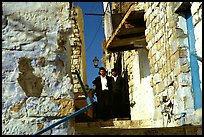 Orthodox jews in a narrow alley, Safed (Tsfat). Israel