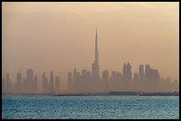 Dubai skyline with Burj Khalifa above Persian Gulf, sunrise. United Arab Emirates ( color)