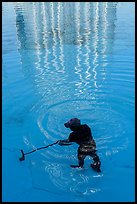 Working cleaning Burj Khalifa fountains. United Arab Emirates ( color)