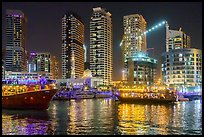 Restaurant boats and Al Rahim Mosque at night. United Arab Emirates ( color)