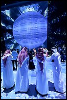 Men in kandura at light show, Saudi Arabia Pavilion. Expo 2020, Dubai, United Arab Emirates ( color)