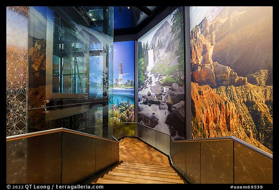 Stars motif, elevator, mural photos of national parks, USA Pavilion. Expo 2020, Dubai, United Arab Emirates