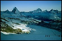 Matterhorn and glaciers at sunrise seen from Monte Rosa, Switzerland. (color)