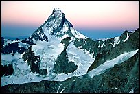 Matterhorn and glaciers at sunrise, Switzerland. (color)