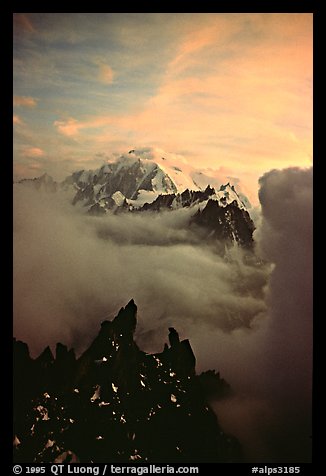 Mont Blanc and approaching storm clouds seen from Les Drus. Alps, France