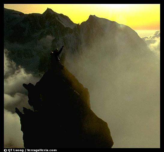 Detail showing two climbers on  the very narrow top of Dent du Geant, Mont-Blanc Range, Alps, France.  (color)